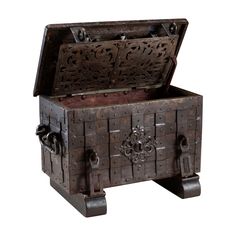 an old wooden trunk with carvings on the lid and handles is shown against a white background