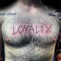 a man with tattoos on his chest has the word waxflex written in it