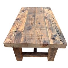 a table made out of wooden planks on a white background with no people around it