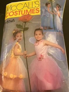 two children's costumes are shown in the catalog