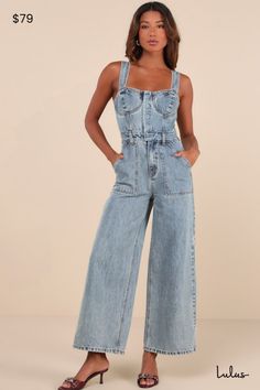 From street style to weekend style, we can't get enough of the Lulus Confirmed Trendsetter Light Wash Denim Bustier Jumpsuit! Sturdy cotton denim, with a subtle acid-washed effect, shapes this enviably cool jumpsuit that has wide straps (with internal, adjustable back buttons) that support a bustier bodice with seamed cups and a sweetheart neckline. Hidden functional snap button placket secures the front, continuing down to a banded waist with belt loops and a hidden zip fly. Wide pant legs feat Bustier Jumpsuit, Denim Bustier, Adhesive Bra, Acid Wash Denim, Weekend Style, Wide Pants, Denim Jumpsuit, Strapless Bra, Light Wash Denim