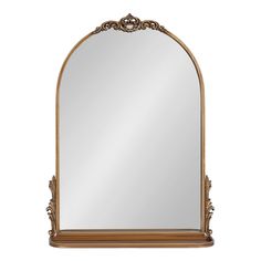 an ornate gold framed mirror on a white background