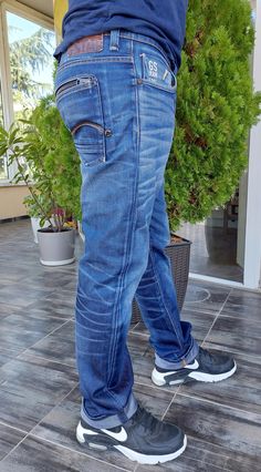 G-STAR Attacc Low Straight Blue Jeans Size W34/L34 Made in VIETNAM COLLECTORS KNOW THEIR TRUE VALUE PLEASE NOTE that our model is 181 cm and 85 kg. ACTUAL MEASUREMENT (Inch) WAIST (from side to side) 44 cm /17.4 inches Inseam  85 cm /34 Inches) Leg Opening 19 cm / 7.5 inches Front Rise 25 cm / 10 inches Back Rise 31 cm / 12 inches Outerseam 112,5 cm / 44,2 inches Material composition  - 100% Cotton Care instructions -  Machine Wash Closure type -  button features The Attacc is identifiable by its rugged back pockets; one with a half concealed zip, and both with flat-rivets and stitched leather on bonded rubber. This version of the Attacc uses a short rise and straight legs from waist to hems. In compact 13.2oz denim with a rich base shade thanks to warp yarns dipped 8 times in indigo. Low Low Straight Jeans, Straight Blue Jeans, True Value, Stitching Leather, G Star Raw, Straight Jeans, Bulgaria, Blue Jeans, Mens Jeans