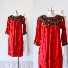 Gorgeous Artisan Made Vintage Handmade Mexican Red Gauze Dress From Chiapas Pullover Tassel Ties On The Sleeves. Bracelet Length Sleeves Great Vintage Condition. Material: Cotton Size: Refer To Measurements Measurements Taken Flat Bust - 21." Waist - 34" Length - 46" Shoulder To Hem Tags Mexico Mexicana Textile Art Embroidered Embroidery Oaxaca Fiesta Frida Kahlo Day Of The Dead Celebration Folk Peasant Boho Bohemian Boheme Long Sleeve Gauze Gauzy Hippie Festival Day Of The Dead Celebration, Gauze Dress, Hippie Festival, Handmade Dresses, Day Of The Dead, The Dead, Boho Bohemian, Textile Art, Red Yellow