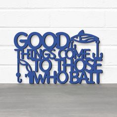 a metal sign that says good things come to those who bat