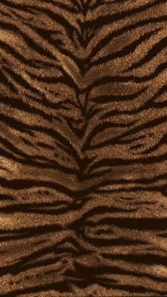 an animal print pattern that looks like it is made out of brown and black fur