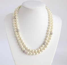 This large pearl necklace is made of genuine pearls. It's a classic piece that will add a touch of elegance to any outfit. The pearls are a creamy white color and have a beautiful luster. The necklace is long enough to wear with a variety of necklines, and the clasp is secure so you won't have to worry about losing it. Formal Long Pearl Necklace, Formal Cream Pearl Necklace, Cream Pearl Necklace For Formal Occasions, Large Pearl Necklace, Tennis Bracelet, Creamy White, Cream White, White Color, Pearl Necklace