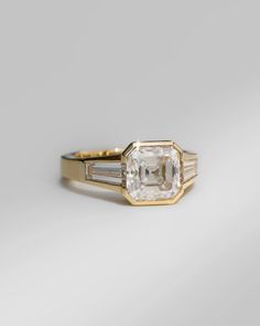 an oval and baguette cut diamond ring