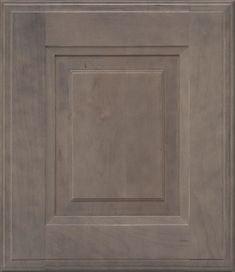 a close up view of a wooden cabinet door