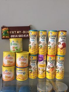 there are many baby food items on the shelf