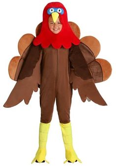 a man in a turkey costume standing with his hands on his hips