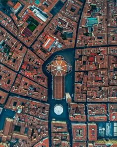 an aerial view of a city with lots of buildings