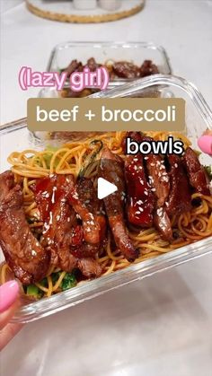 a person holding up a plastic container filled with beef and broccoli bowels