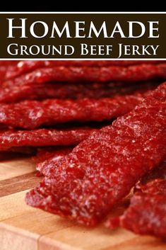 raw ground beef on a cutting board with text overlay that reads homemade ground beef jerry