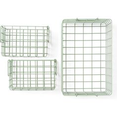 three green wire baskets sitting next to each other on a white surface, one is empty and the other two are closed