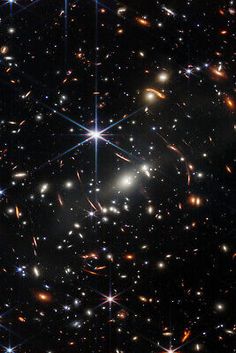 an image of many different stars in the night sky with bright lights on top and bottom