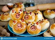 pigs in a blanket on a blue plate