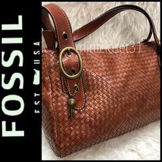 Fossil Signature Purse In Luxurious Genuine Leather Shoulder Bag! Features Fossil 1954 Collection In Rich Brown Woven Leather! From The Finest Topgrain Leather With Brass Tone Hardware Details With Fossil Key Hang Tag! Created To Last A Lifetime! Adjustable Buckle Details On Handles! Top Zipper Closure Opens To Fully Lined Interior With Zip, Slip Pockets! Double Handles Drop About 10 Inches! Medium Sized, Used Once In Great Exterior Condition, See Interior Wear/ Make Up Stain On Slip Pocket! Elegant Woven Leather Satchel, Cognac Rectangular Shoulder Bag With Silver-tone Hardware, Rectangular Cognac Shoulder Bag With Silver-tone Hardware, Fossil Satchel, Brown Pebbled Leather Bag With Gold-tone Hardware, Distressed Brown Leather-backed Rectangular Shoulder Bag, Fossil Bags, Leather Satchel Bag, Leather Satchel