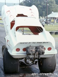 the car is being driven by two large tires