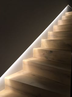 the light is shining down on some stairs