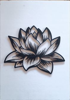 a black and white drawing of a lotus flower on a white paper background with wood frame