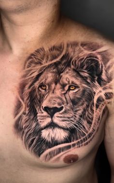 a man with a lion tattoo on his chest