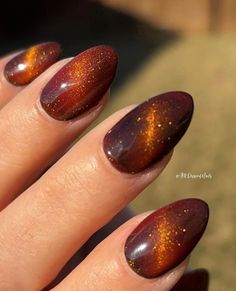 Pull out all the stops with these special effects gel polishes! ⭐️ is The Cat's Meow! 🐈️🧲🌡️ These babies have a temp changing pigment in the base + magnetic cats eye shimmer for infinitely stunning looks!🧡⁠ Shop here and get 65% of a gel starter kit: https://www.peppigel.com/dipdelights ⁠ -⁠ #ChristmasNails #peppigel #dippowder #dippowdermanicure #dippowdernails #dip #glitter #diy #nails #glitternails #diy #dipnails #nailart #mani #inspo #sparkle #sparklynails #sparkly #gel #dipgel #geldip #... Magnetic Dip Nails, November Nails Cat Eye, October Cat Eye Nails, Tigers Eye Nails Polish, Thanksgiving Nails Cat Eye, Orange Magnetic Nails, Fall Festive Nails, Cat Eye Orange Nails, Autumn Nails Cat Eye