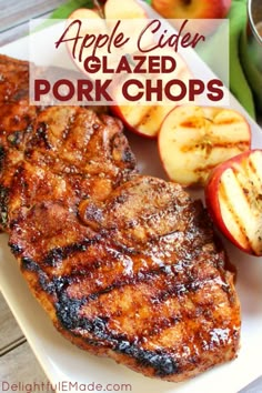 an apple cider glazed pork chops on a white plate