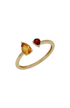 A warm citrine is perfectly paired with a fiery garnet to punctuate this handcrafted ring with blazing shine. 1/8"W x 1/8"L garnet setting; 1/8"W x 1/4"L citrine setting Total stone weight: 0.60ct. 14k gold/citrine/garnet Imported 14k Yellow Gold Topaz Ring With Gemstone Accents, Multi-stone Garnet Ring In Yellow Gold, Yellow Gold Garnet Multi-stone Ring, Yellow Gold Garnet Rings With Gemstone Accents, 14k Yellow Gold Ruby Ring With Gemstone Accents, Yellow Gold Citrine Birthstone Ring, Bony Levy, Dream Engagement, Garnet Jewelry