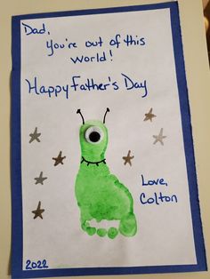 a father's day card with a green monster on it