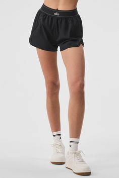 Make the match. The Match Point Short is a high-cut performance staple — made from lightweight woven fabric with a relaxed fit and built-in brief for comfortably pushing the limits at practice. An elastic logo waistband finishes off the look and an invisible side pocket stores small essentials on-the-go. Alo Shorts, Skater Outfit, Running Outfits, Sweater Knit Skirt, Teen Outfits, Match Point, Workout Sets, Figure Skater, Alo Yoga