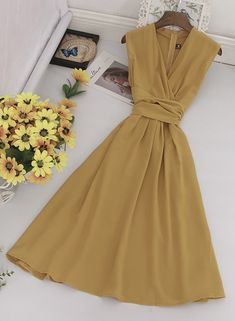 Simple v neck chiffon short dress summer dressFabric: chiffonColor: A, B, C, D, E, F, G, HSize(cm): free sizelength 100 bust 96 waist 82If you want to know more detailed pictures about the dress, please contact us, thank you. Elegant A-line V-neck Dress For Beach, Elegant A-line V-neck Beach Dress, Beige Chiffon V-neck Dress, Solid V-neck Chiffon Dress, Chiffon V-neck Sleeveless Dress For Vacation, Beige V-neck Chiffon Dress, Beige V-neck Sleeveless Summer Dress, Chic V-neck Chiffon Beach Dress, Summer Beach V-neck Chiffon Dress