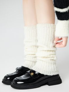 Embrace the chill of autumn and winter with these delightful leg warmers, available in classic shades of white, black, and gray. Crafted from a soft, cozy knit, these leg warmers are designed to keep you warm and stylish all season long. Winter Acrylic Socks, Casual Acrylic Winter Socks, Warm Solid Socks For Fall, Casual Acrylic Socks For Winter, White Knee-high Comfortable Leg Warmers, Comfortable White Knee-high Leg Warmers, Gray Mid-calf Socks For Fall, Casual Acrylic Socks For Fall, Soft White Knee-high Socks For Winter