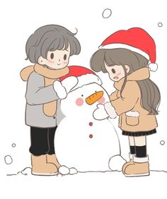 two children building a snowman in the snow