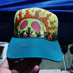 Custom hand painted trucker hat. Mesh back with adjustable size. Trucker Snapback Hat With Curved Brim For Festivals, Festival 5-panel Trucker Hat One Size, Festival 5-panel Trucker Hat, Multicolor 5-panel Trucker Hat For Summer, Festival Trucker Hat 5-panel, Adjustable Curved Brim Trucker Hat For Festivals, Adjustable Flat Bill Trucker Hat For Festivals, Funky Snapback Hat For Festivals, Multicolor Trucker Hat