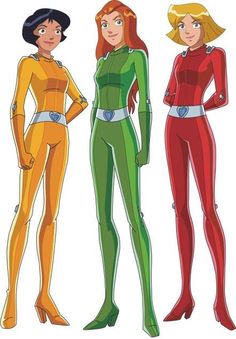 three women in costumes standing next to each other, one with her hands on her hips