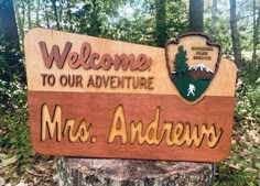 a wooden sign that reads welcome to our adventure, mrs anderey on it