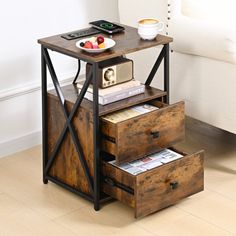 an end table with two drawers and a phone on top