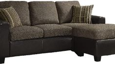 a sectional couch with pillows on it