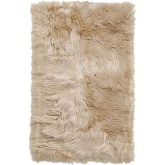 a white rug with shaggy fur on the bottom and one side is shown in an angled position