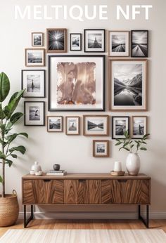 a living room with pictures on the wall and a potted plant next to it