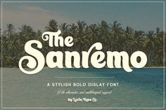 the sanremo display font with palm trees in the background and an ocean view