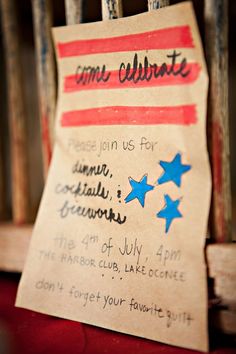 a wooden chair with a sign on it that says time to celebrate join us for dinner, cocktail and fireworks