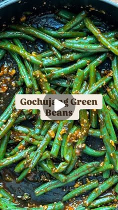 green beans cooking in a skillet with sesame seeds on the side and text gochug & green beans