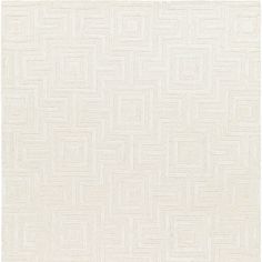 a white rug with squares and lines on it