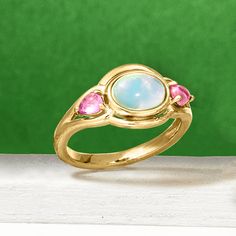 Ross-Simons - Ethiopian Opal, .40ct t. w. Pink Tourmaline Ring Over Sterling. Size 5. Add a mystical touch to your outfit with this ring. Here, a 6x8mm oval Ethiopian opal cabochon beams next to .40 ct. t. w. pear-shaped pink tourmaline cabochons. Set in polished 18kt yellow gold over sterling silver. 3/8" wide. Pink tourmaline and Ethiopian opal ring. Opal birthstones are the perfect gift for October birthdays. October Birthdays, Gold Opal Ring, Opal Birthstone, Ethiopian Opal Ring, Pink Tourmaline Ring, Ring Opal, Opal Ring Gold, Tourmaline Ring, Character Ideas