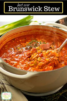 a white bowl filled with soup on top of a table