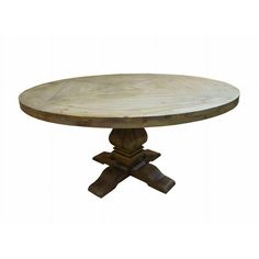 a round wooden table with two crossed legs