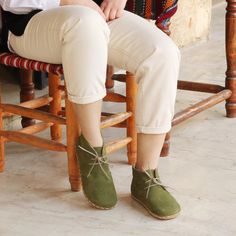 Experience the natural elegance of our Green Oxford Boots Women's. Handmade from luxurious green nubuck leather, these zero-drop barefoot boots offer a perfect blend of style and functionality. The design promotes natural foot posture and movement, while the rubber sole ensures durability and traction. Ideal for those who appreciate the grounding benefits of genuine leather, these boots provide comfort and sophistication for any occasion. Although the product photos show a rubber sole, our stand Oxford Boots Women's, Grounding Benefits, Boot Leggings, Barefoot Boots, Handcrafted Boots, Oxford Boots, Handmade Leather Shoes, Drop Design, Sheepskin Boots