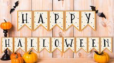 happy halloween banner with pumpkins and bats on wooden background stock photo - premium royalty